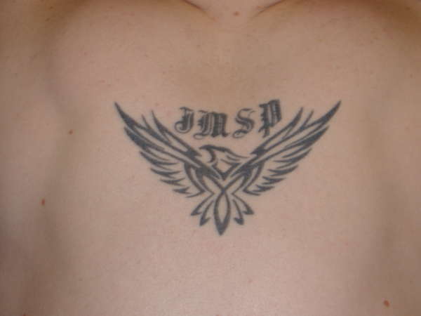 tribal eagle and initials tattoo