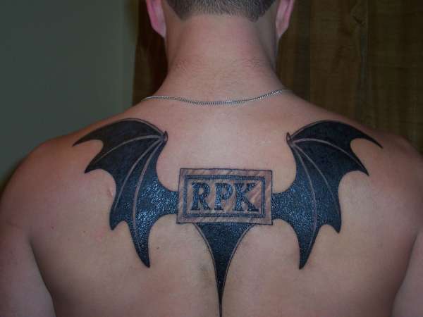 intials with bat wings tattoo