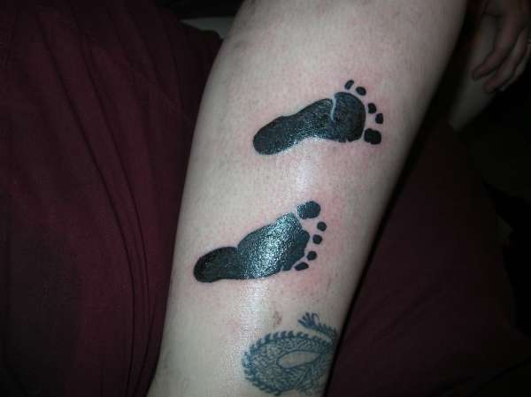 foot prints tattoo