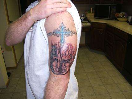 good vs. evil with eternal flames tattoo