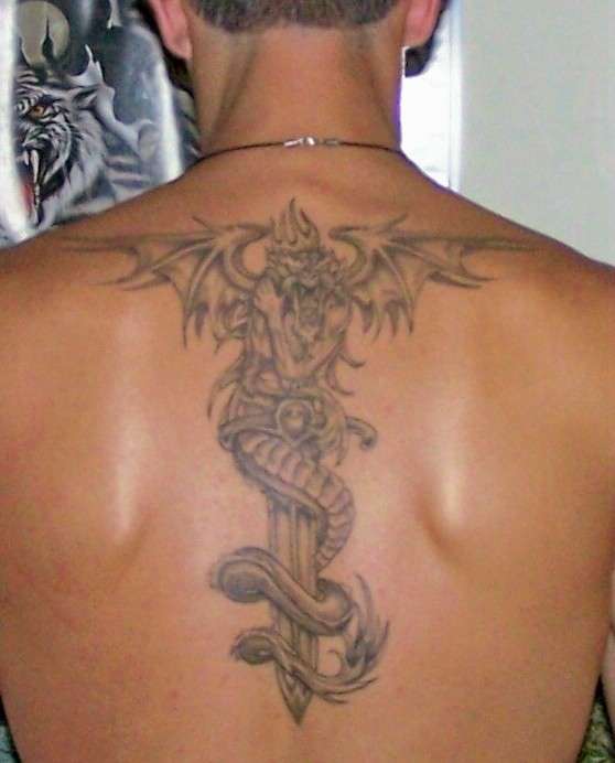 Dragon back piece tattoo