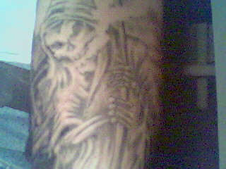 my dads reaper. tattoo