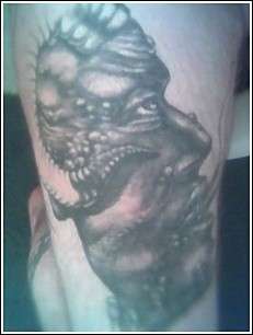 Deamon lickin my BALLS tattoo