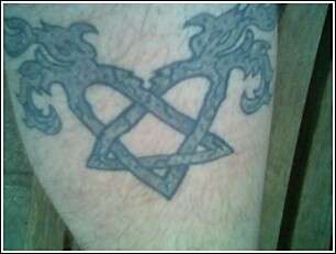 Another Heartagram but mine is 4 years old tattoo