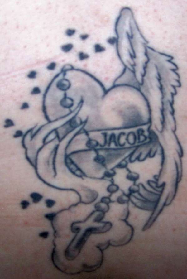 Heart, wings, name, cross tattoo
