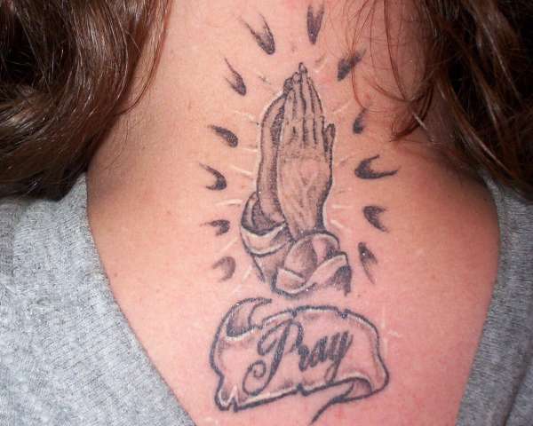 praying hands tattoo