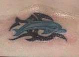 3rd tat on lower back tattoo