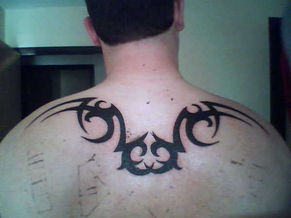 Tribal Wings tattoo