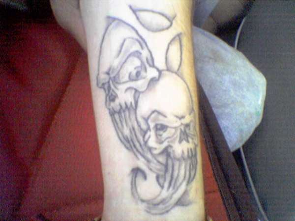 skull twins tattoo