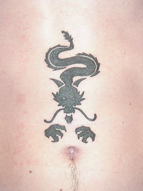 tribal dragon stomach tattoo