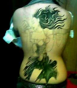 demonic girl tattoo