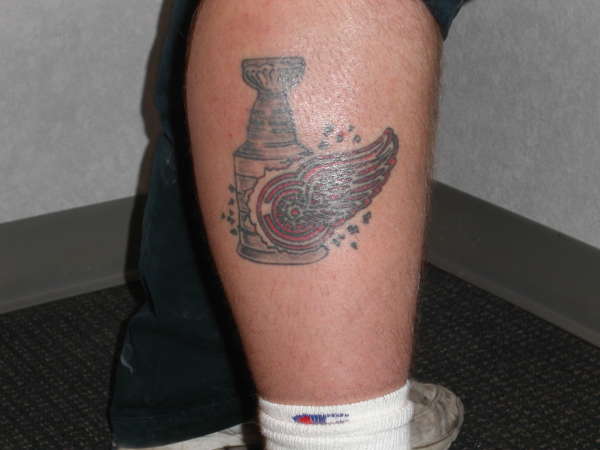 red wings tattoo