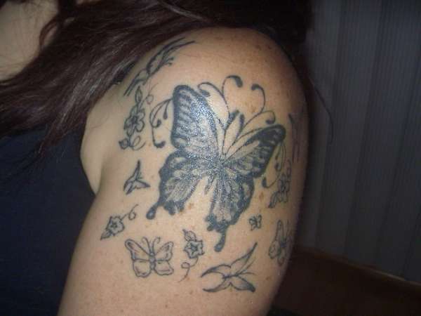 my butterflys n flowers tattoo
