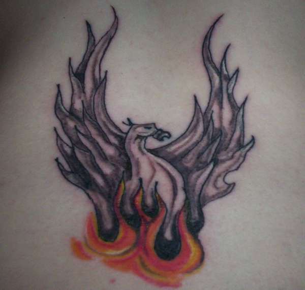 Lower back Pheonix tattoo