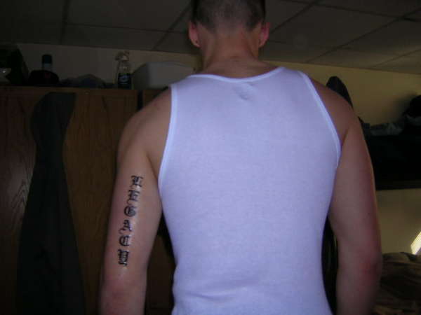 first Tat tattoo