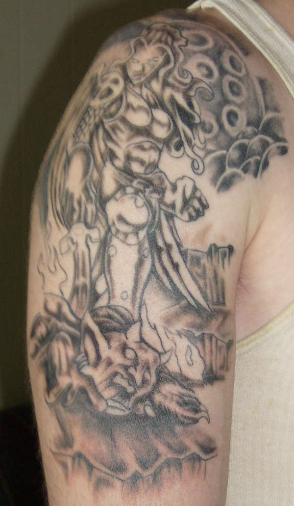 angel fighting satan tattoo