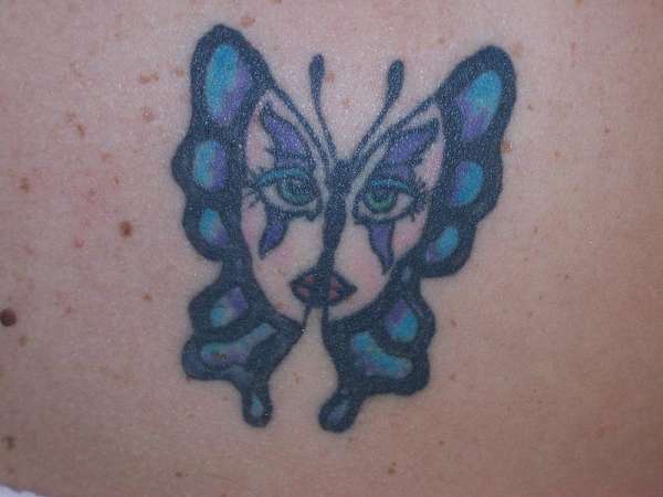 butterfly mask tattoo