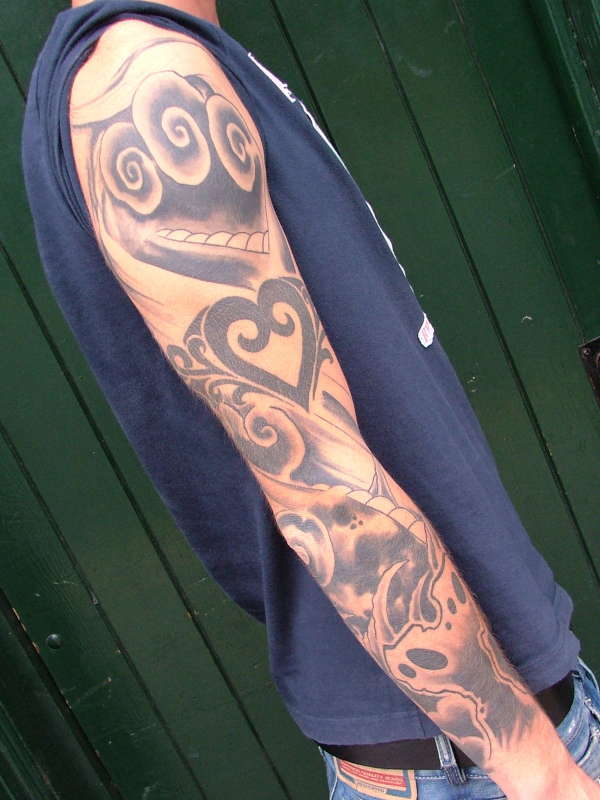 Adam's Japanese black and grey sleeve. tattoo