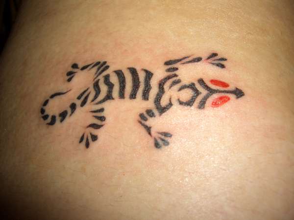 tribal lizard tattoo