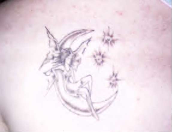 Fairy on the moon tattoo