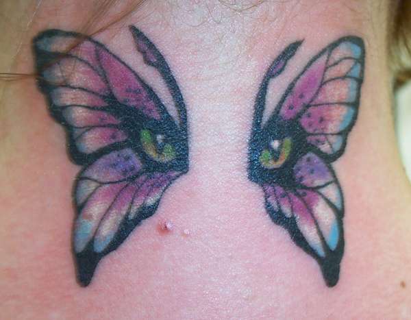 Eyes & Wings tattoo