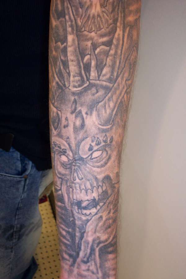 skull devil guy tattoo