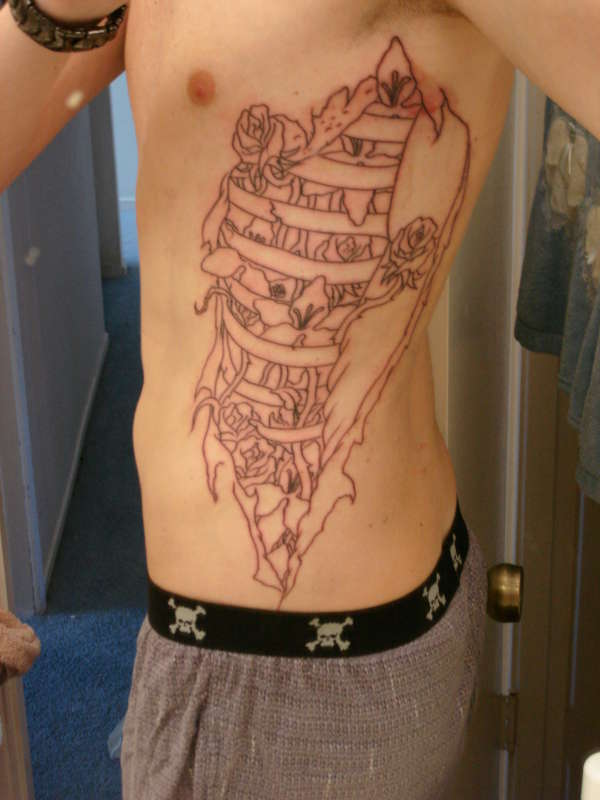 lline work on ribs tattoo