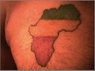 africa in Ites, Gold, and Green tattoo