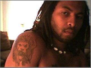 Conquering lion of judah with spliff tattoo