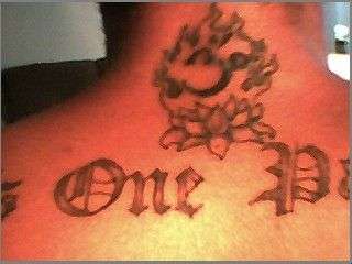 Om with Lotus and Flames tattoo