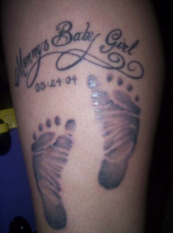 Daughter footprints tattoo