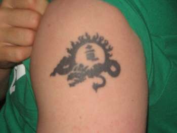 dragon under the sun tattoo