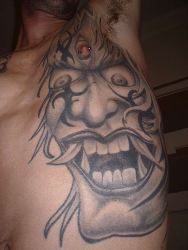 Demonic Face tattoo