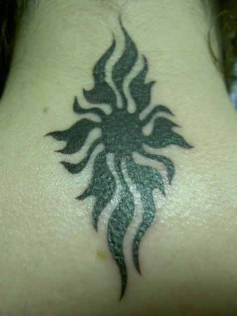 tribal sun tattoo