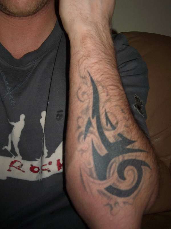 left reverse forearm tattoo