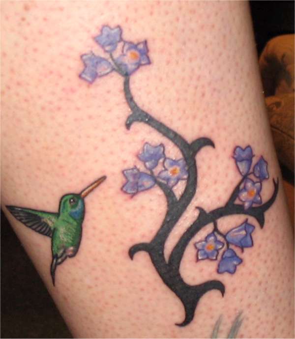 bird and flowers tattoo