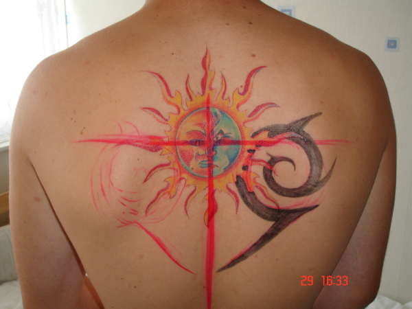 sun and moon with tribal tattoo