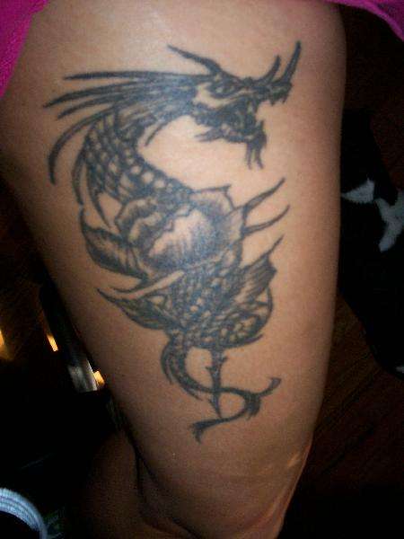 dragonthigh tattoo