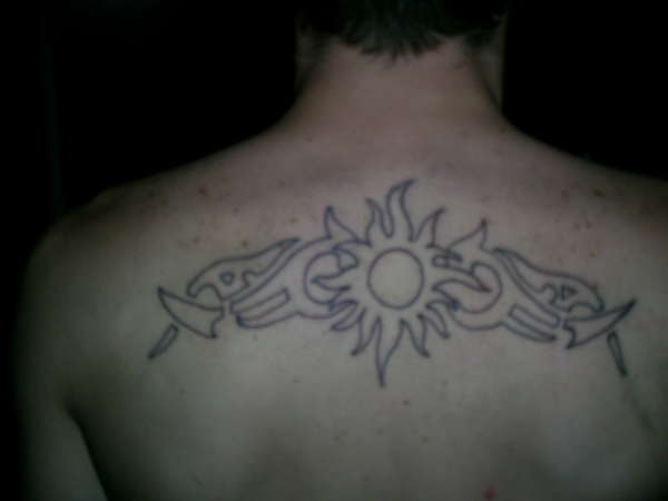 Sun tribal tattoo
