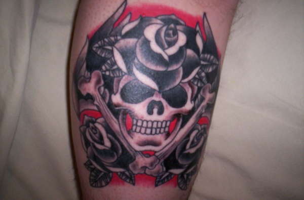 Skull and Crossbones with Roses tattoo