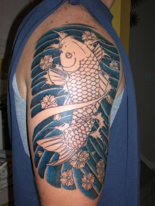 my koi fish in the works tattoo