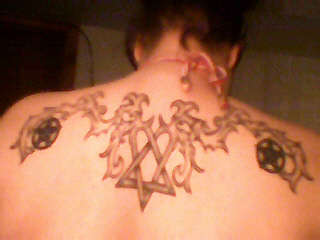 Heart And Pentacle's tattoo