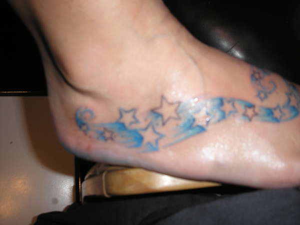 stars on foot tattoo