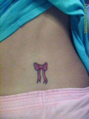 Tied with a bow tattoo