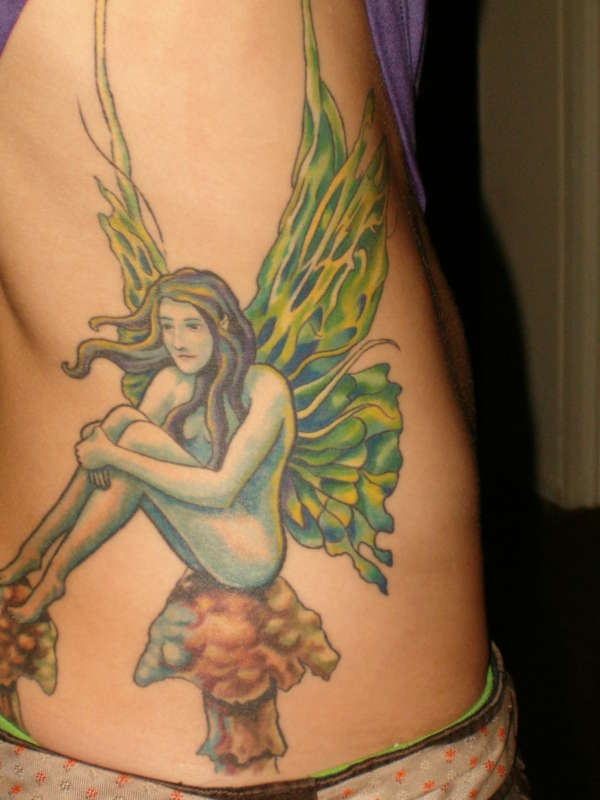 Thinking fairie tattoo