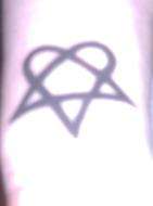 Heartagram tattoo