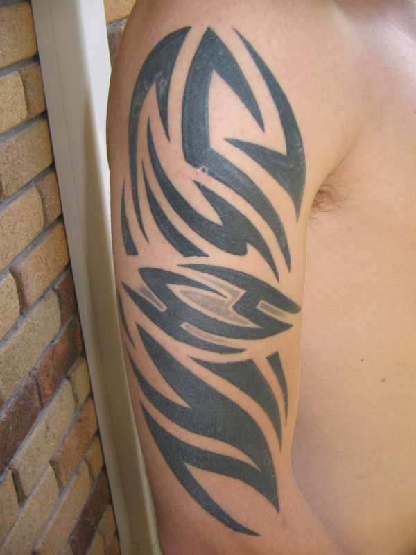 Tribal arm tat tattoo