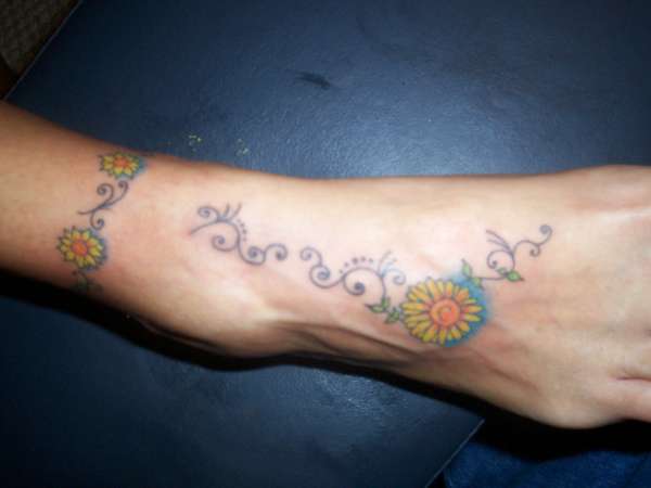 Sunflower foot tattoo