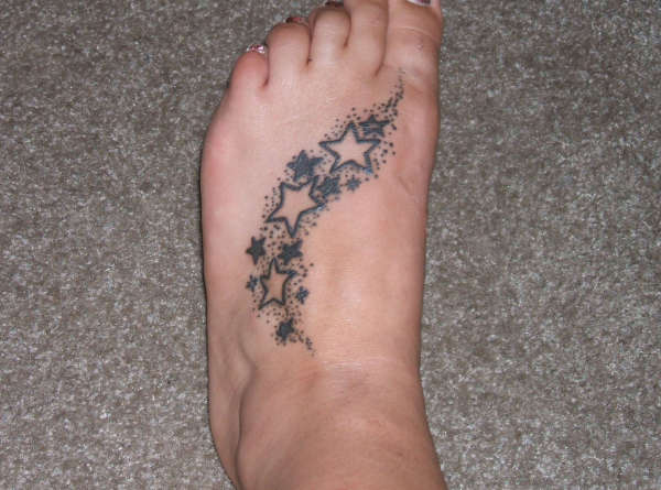 Foot full of stars tattoo