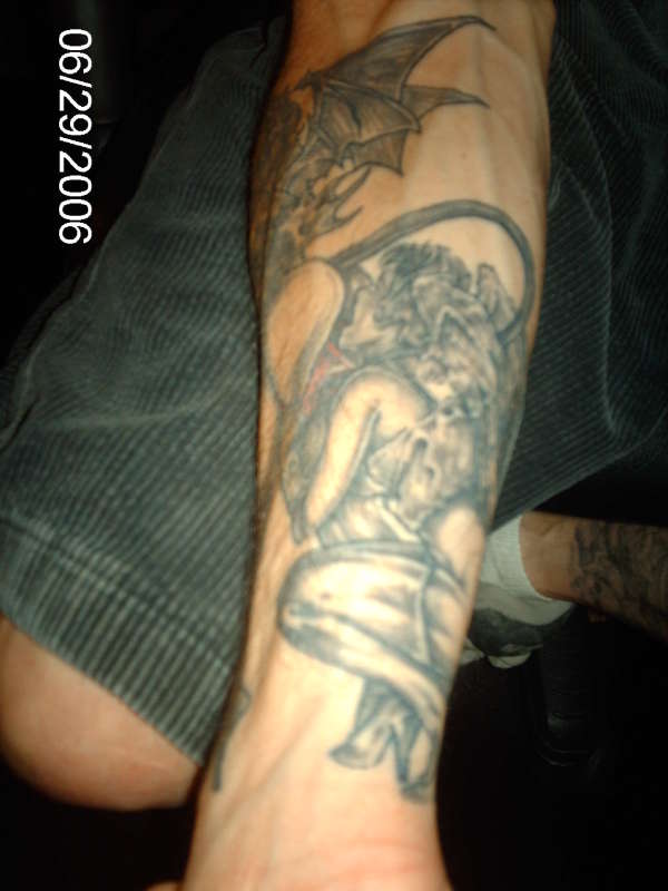 Angel & Demon At Play tattoo
